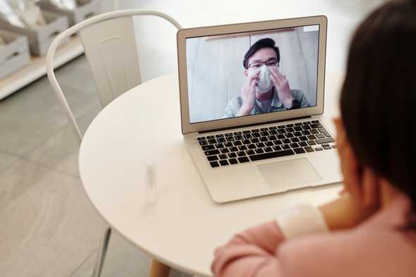 Doctor talking to a patient over video call